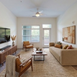 Open space living area with natural lighting