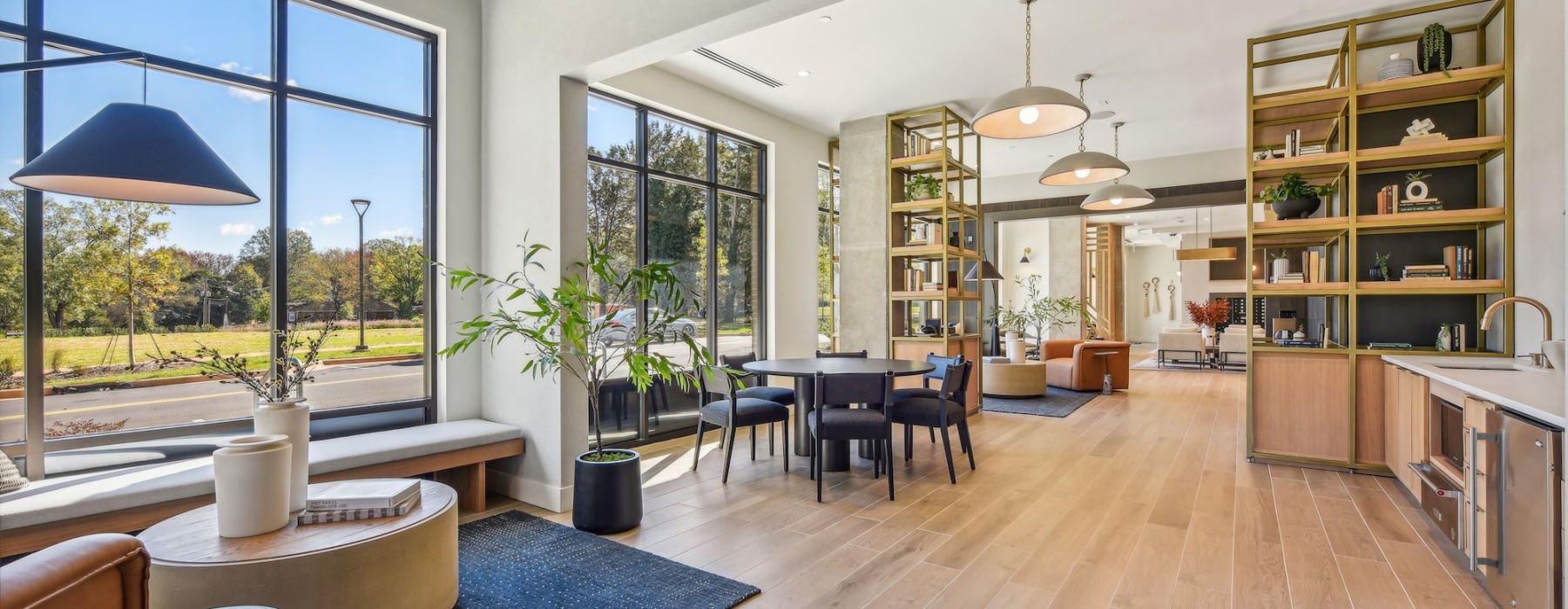 a room with a bar and chairs